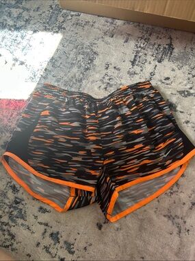 Nike Women’s Black and Orange Athletic Running Shorts